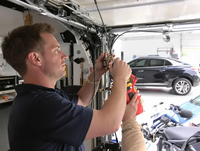 Aliso Viejo Garage Door Repair safety certified technician performing cable replacement in Aliso Viejo