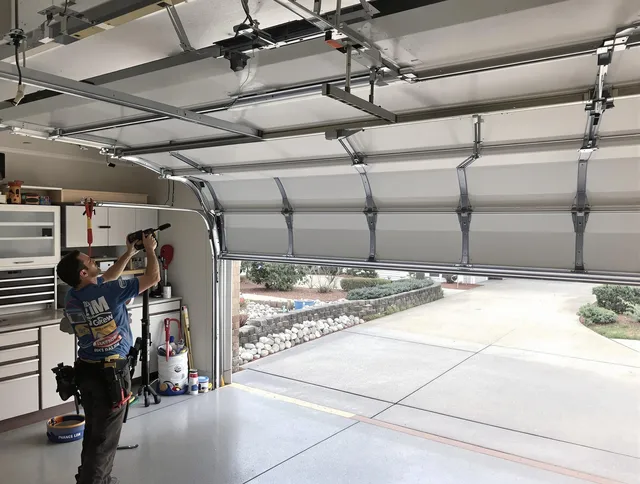 Garage door track repair service by Aliso Viejo Garage Door Repair in Aliso Viejo
